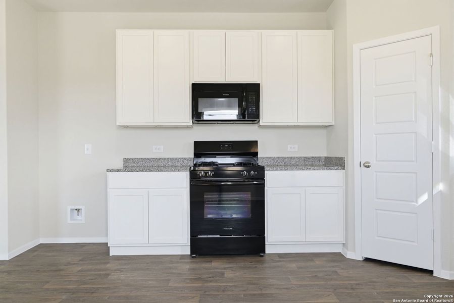 Furnished interior view inside a new home in Hunters Ranch, San Antonio (Image 14).