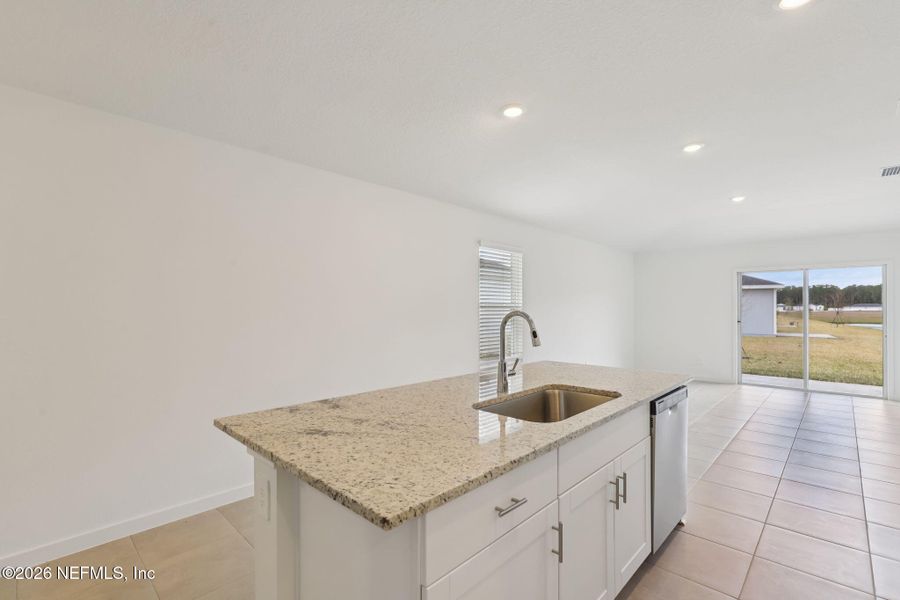 Furnished interior view inside a new home in Flagler Village - Classic Series, Palm Coast (Image 7).