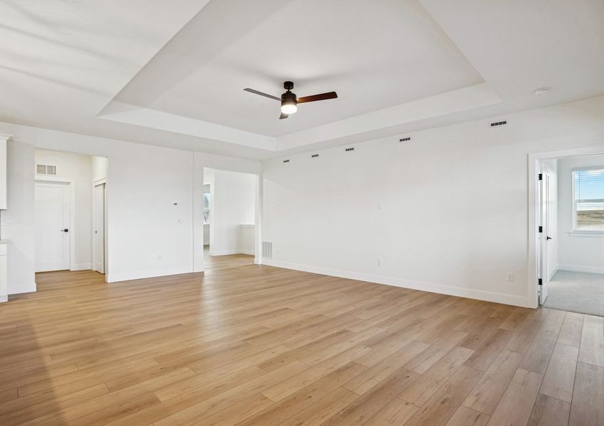 The family room is spacious and has room for everyone to have a seat.