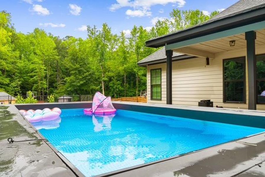 Exterior details and patio area of a home in , Douglasville (Image 25).