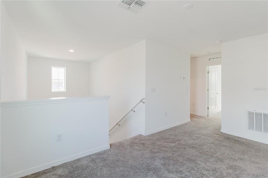 Spacious, unfurnished interior of a new home in Peace Creek Reserve, Winter Haven (Image 23). Spacious, unfurnished interior of a new home in Peace Creek Reserve, Winter Haven (Image 23).