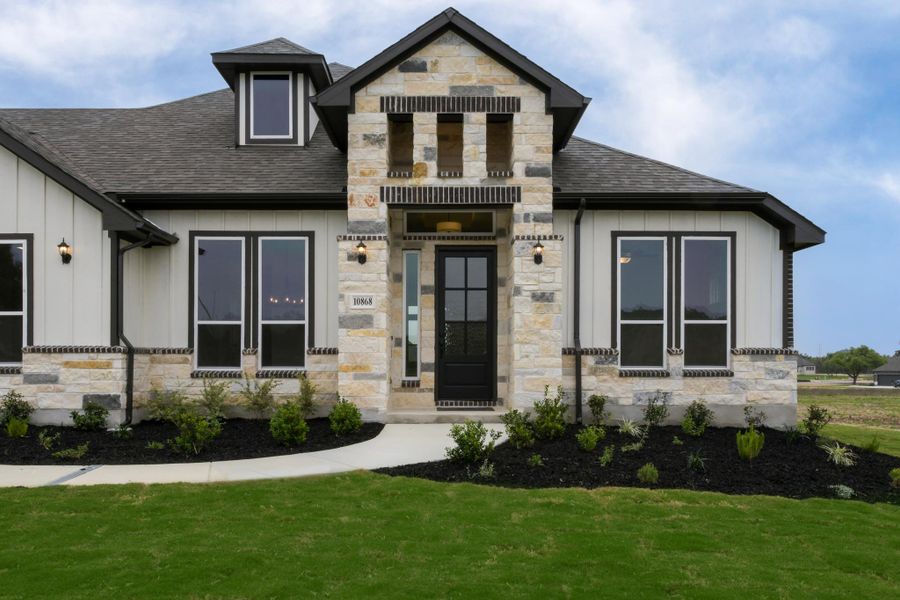 Representative exterior photo of a completed home built from the Avalon II by Ashton Woods in Waldsanger, New Braunfels, TX (Image 2). Representative exterior photo of a completed home built from the Avalon II by Ashton Woods in Waldsanger, New Braunfels, TX (Image 2).