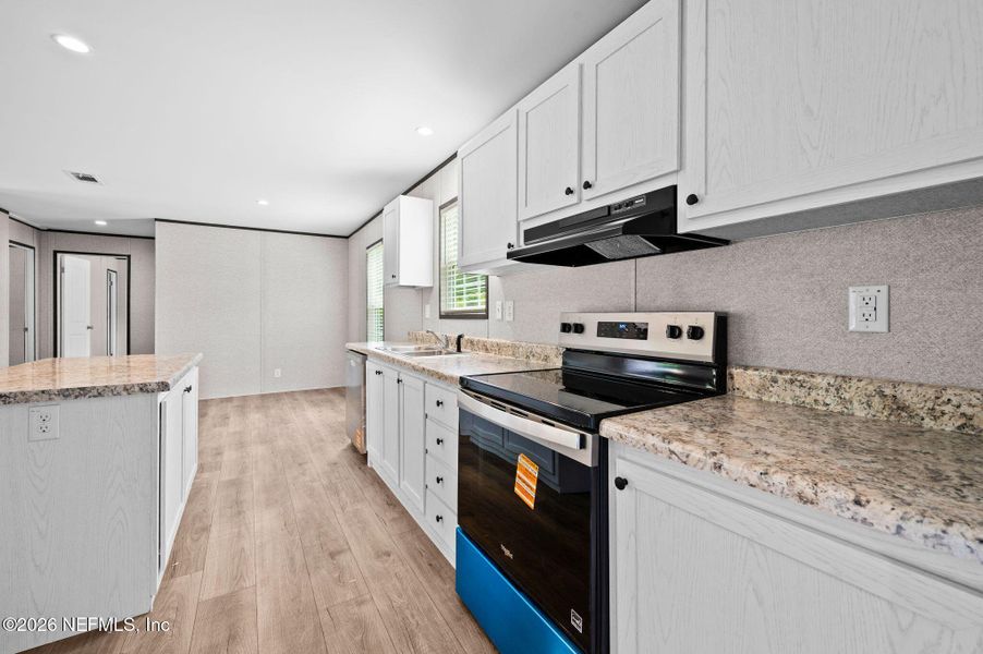 Furnished interior view inside a new home in , Lake City (Image 7).