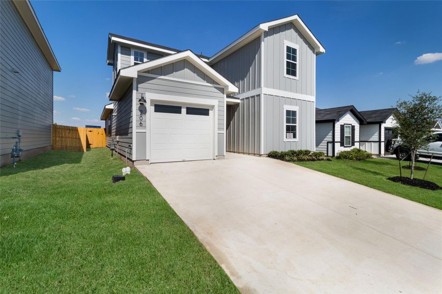 Front exterior of a new home in Marigold, Uhland, TX, highlighting curb appeal (Image 16). Front exterior of a new home in Marigold, Uhland, TX, highlighting curb appeal (Image 16).