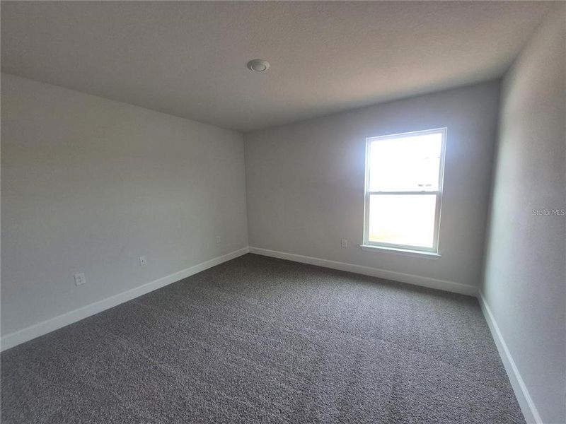 Spacious, unfurnished interior of a new home in Hill Country Estates, Dade City (Image 11).
