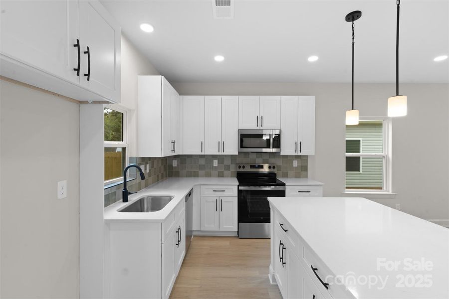 Furnished interior view inside a new home in , Charlotte (Image 9).