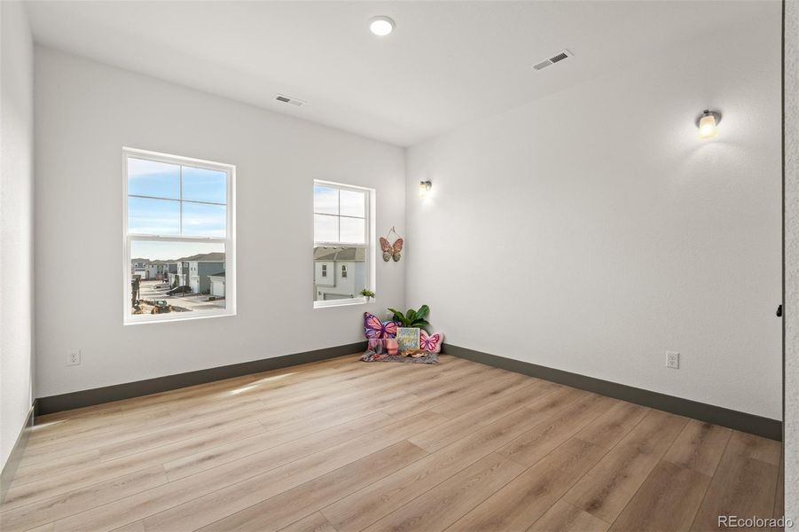 Spacious, unfurnished interior of a new home in Revel Crossing at Wolf Ranch - The Panorama Collection, Colorado Springs (Image 38).