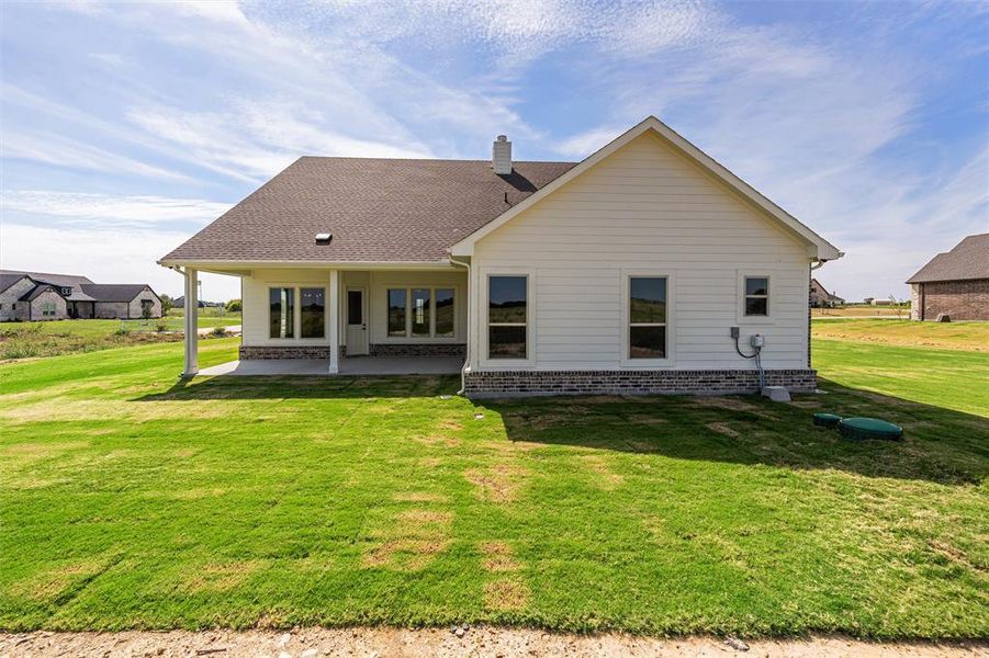 Exterior details and patio area of a home in Rocky Top, Krum (Image 3). Exterior details and patio area of a home in Rocky Top, Krum (Image 3).