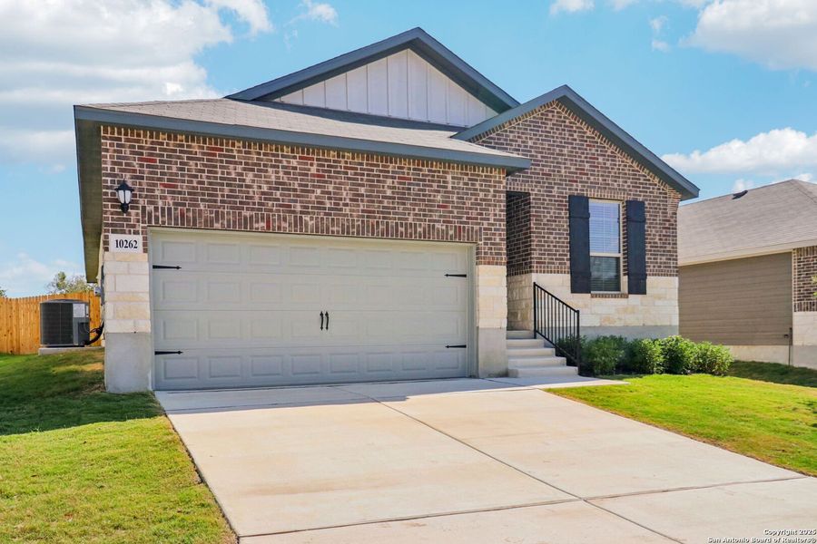 Front exterior of a new home in Royal Crest, San Antonio, TX, highlighting curb appeal (Image 2). Front exterior of a new home in Royal Crest, San Antonio, TX, highlighting curb appeal (Image 2).
