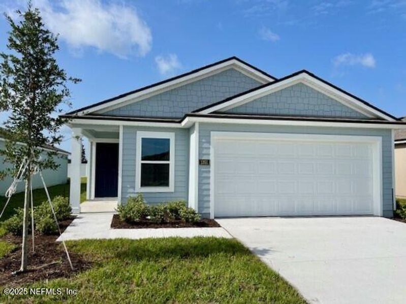 Front exterior of a new home in Rookery, Green Cove Springs, FL, highlighting curb appeal (Image 12). Front exterior of a new home in Rookery, Green Cove Springs, FL, highlighting curb appeal (Image 12).