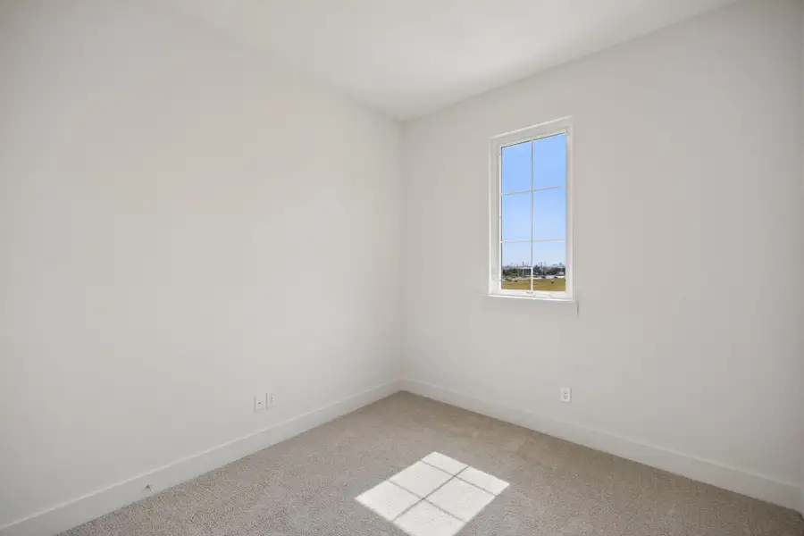 Spacious, unfurnished interior of a new home in Newman Village Townhomes, Frisco (Image 33).
