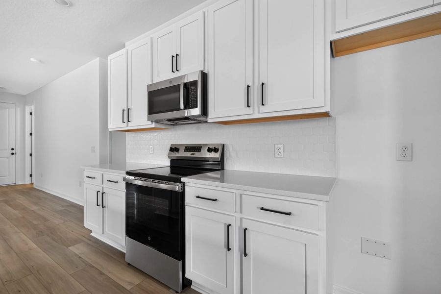 Furnished interior view inside a new home in Catamaran Cove, Rockledge (Image 8).