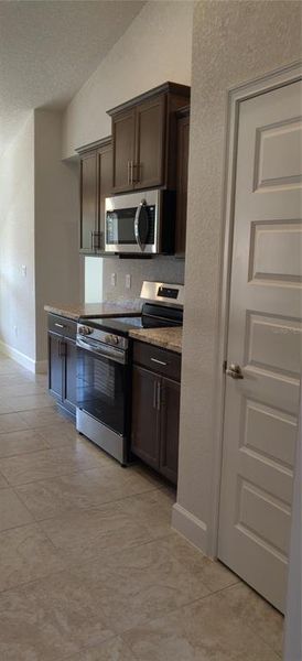 Furnished interior view inside a new home in Royal Highlands, Weeki Wachee (Image 3).