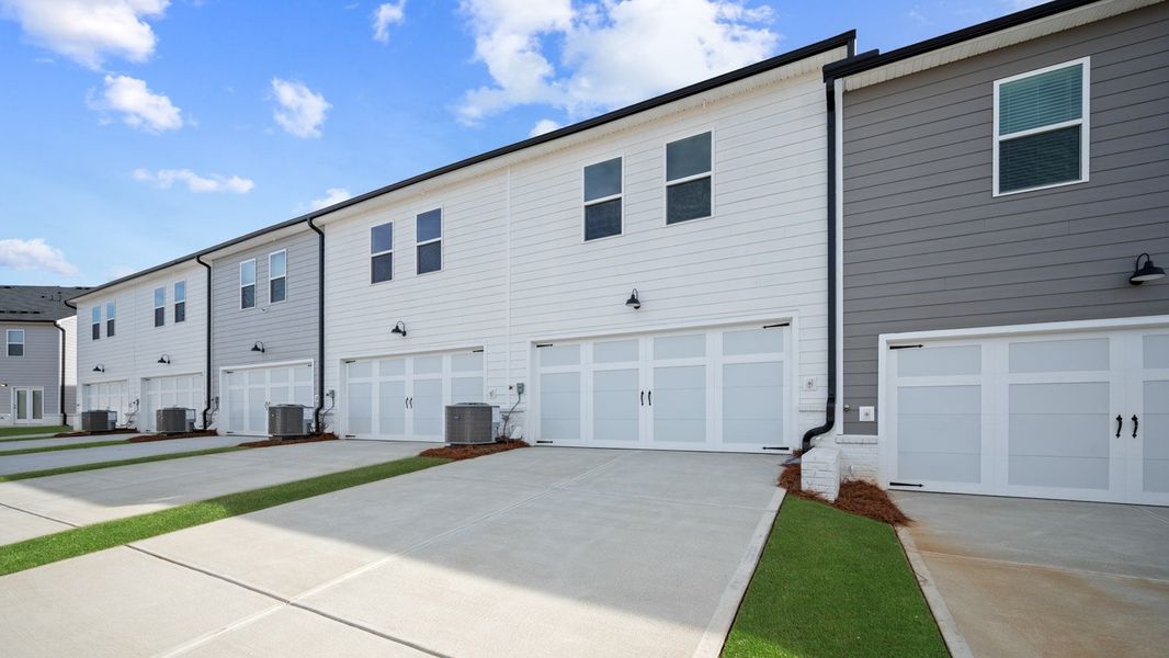 Exterior details and patio area of a home in Echo Glen, Stockbridge (Image 3).