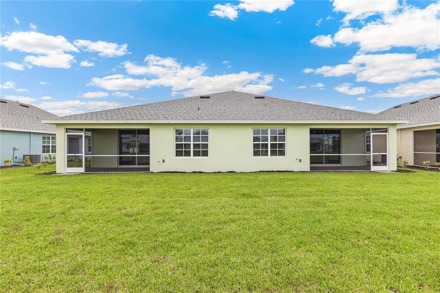 Exterior details and patio area of a home in Heritage Lake Park, Punta Gorda (Image 1).