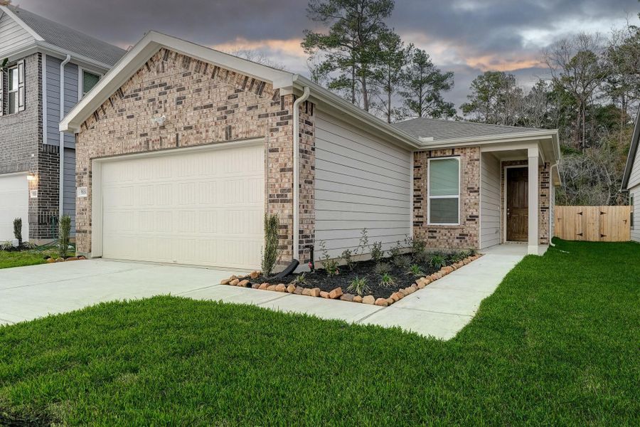 Front exterior of a new home in Creekside Court, Magnolia, TX, highlighting curb appeal (Image 1). Front exterior of a new home in Creekside Court, Magnolia, TX, highlighting curb appeal (Image 1).