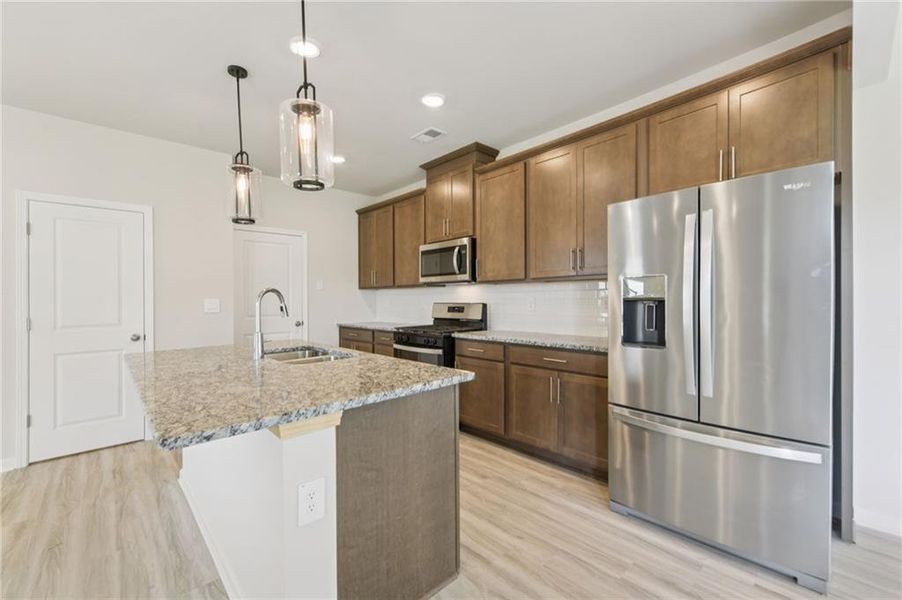 Furnished interior view inside a new home in Avalon - Reserve Series, Conyers (Image 8).