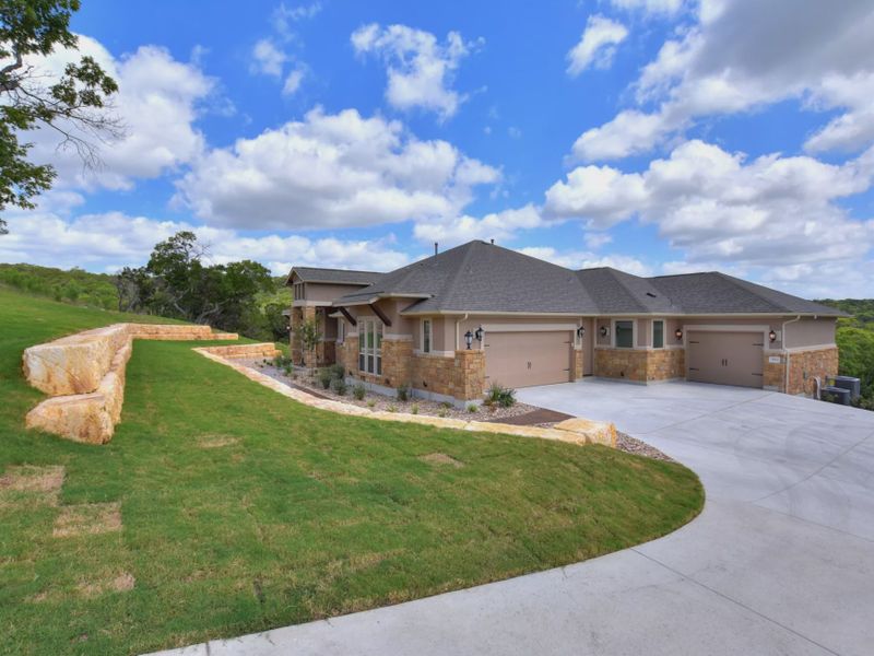 Representative exterior photo of a completed home built from the San Simeon II by Giddens Homes in Leander Estates, Leander, TX (Image 1).