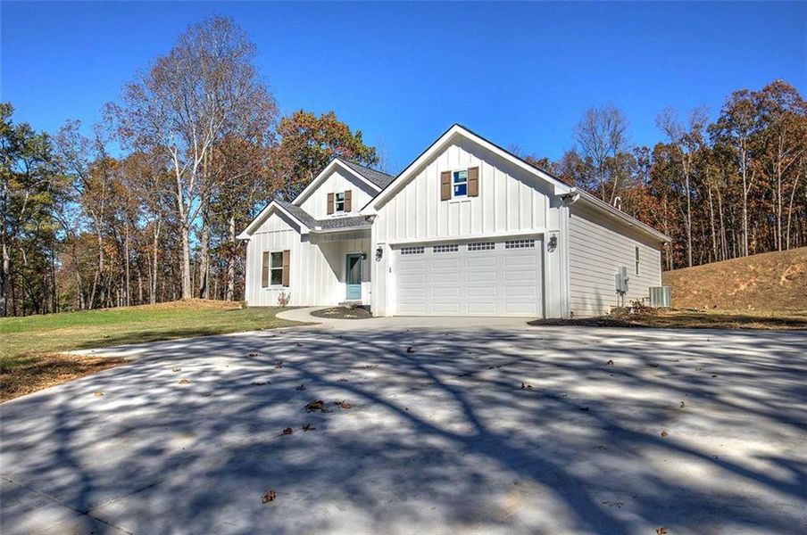 Front exterior of a new home in , Cartersville, GA, highlighting curb appeal (Image 16). Front exterior of a new home in , Cartersville, GA, highlighting curb appeal (Image 16).
