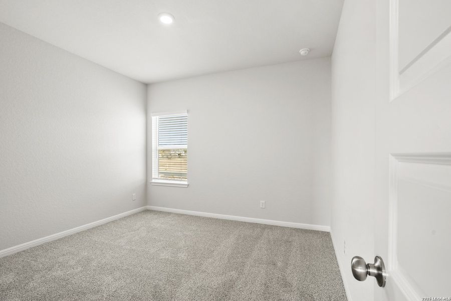 Spacious, unfurnished interior of a new home in Melissa Ranch, San Antonio (Image 20).