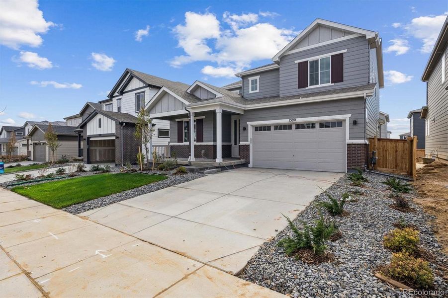Exterior details and patio area of a home in Floret Collection at Parkdale Commons, Lafayette (Image 16).