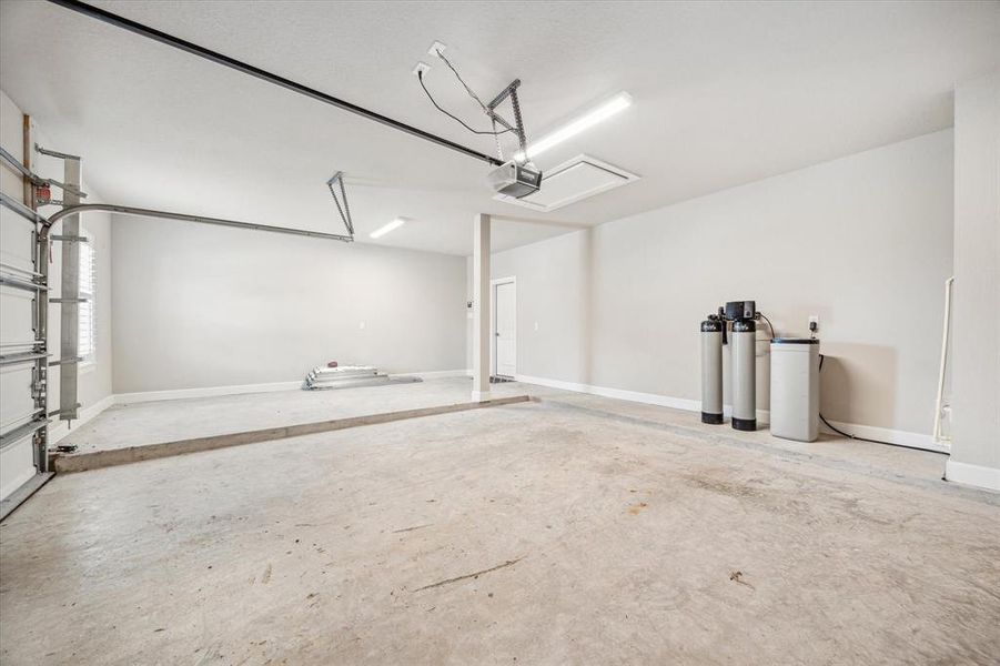 Oversized two car garage.  Note the water filtration system with reverse osmosis.