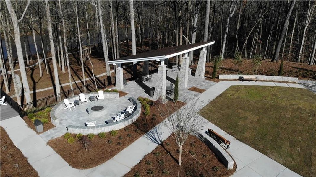 Community fire pit and covered barbecue area