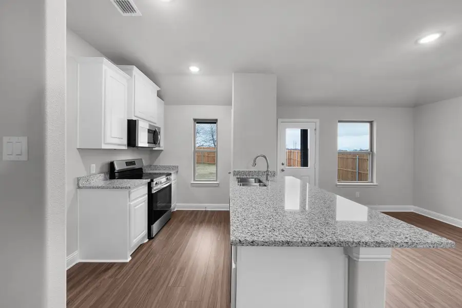 Furnished interior view inside a new home in Stonecreek, Sulphur Springs (Image 6).