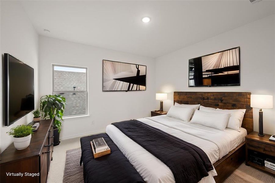 Secondary bedroom is large in size with neutral carpet.