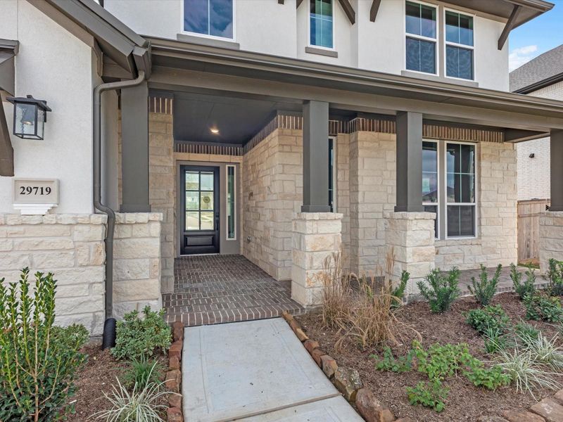 Exterior details and patio area of a home in Cross Creek Ranch 65′, Fulshear (Image 4).