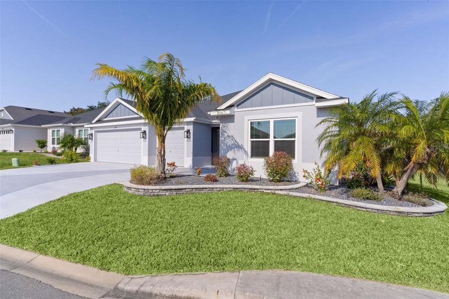 Front exterior of a new home in , The Villages, FL, highlighting curb appeal (Image 26). Front exterior of a new home in , The Villages, FL, highlighting curb appeal (Image 26).