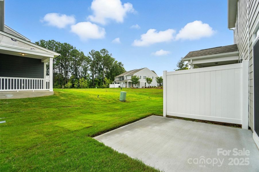 Front exterior of a new home in Harrisburg Village Townhomes, Harrisburg, NC, highlighting curb appeal (Image 23). Front exterior of a new home in Harrisburg Village Townhomes, Harrisburg, NC, highlighting curb appeal (Image 23).