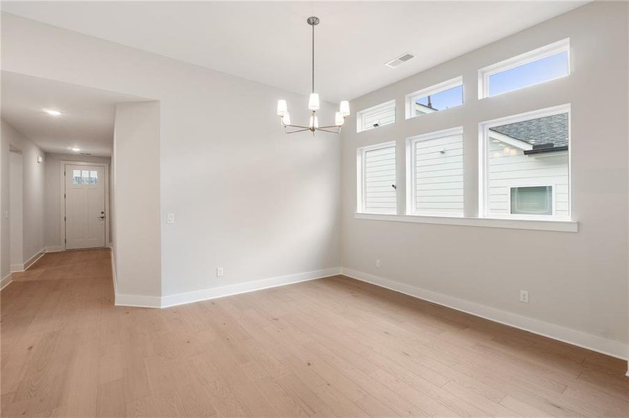 Spacious, unfurnished interior of a new home in Maple Grove at Towne Lake, Woodstock (Image 11).