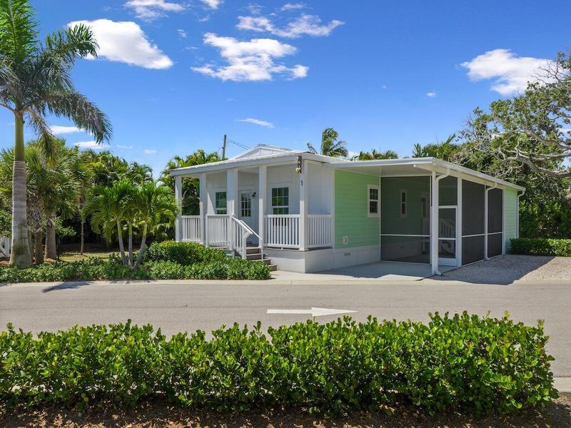 Front exterior of a new home in , Sebastian, FL, highlighting curb appeal (Image 18).