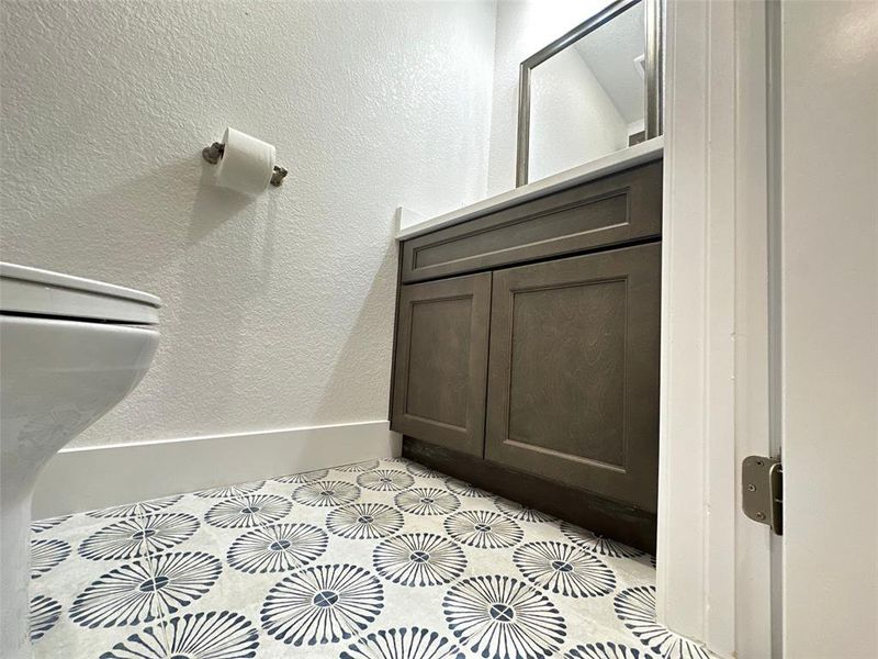 Bathroom with a textured wall