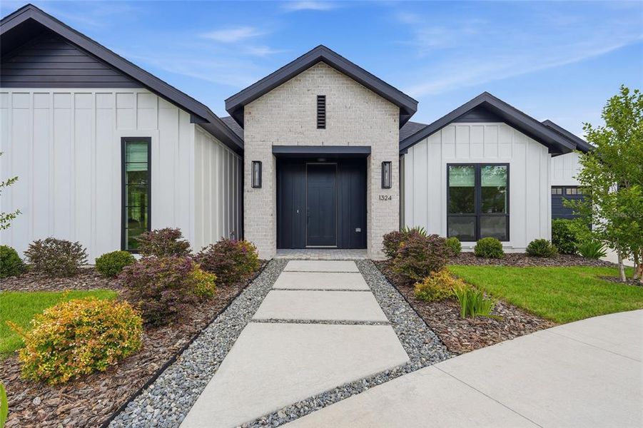 Front exterior of a new home in , Gainesville, FL, highlighting curb appeal (Image 23). Front exterior of a new home in , Gainesville, FL, highlighting curb appeal (Image 23).