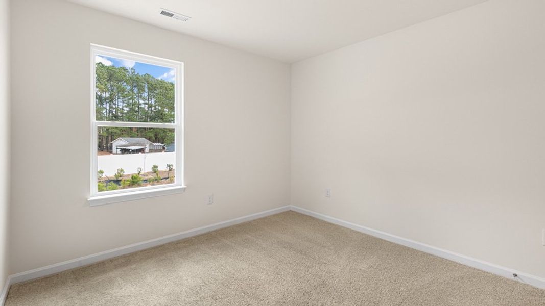 Spacious, unfurnished interior of a new home in The Townes at Honeycutt Oaks, Angier (Image 15). Spacious, unfurnished interior of a new home in The Townes at Honeycutt Oaks, Angier (Image 15).