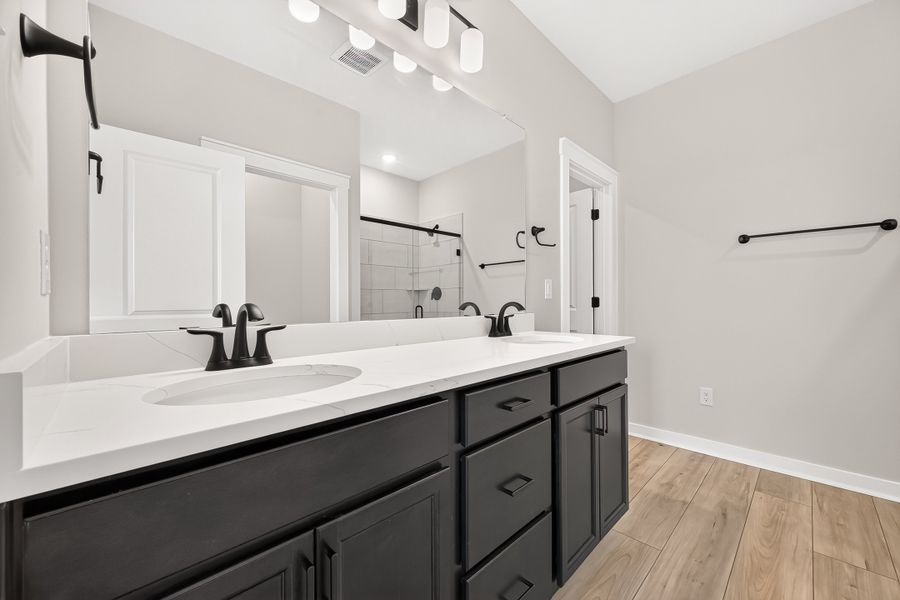 Furnished interior view inside a new home in Aldeana, Bonney (Image 17).