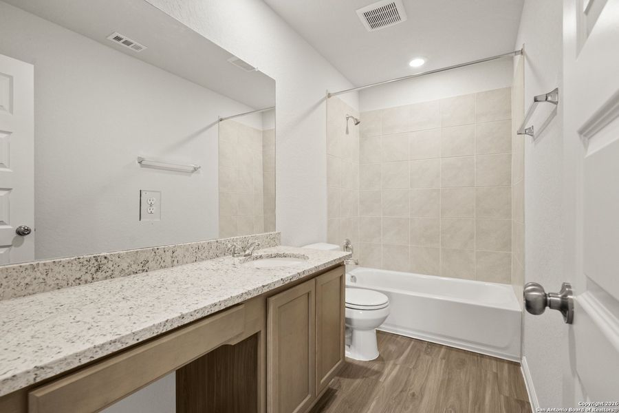 Furnished interior view inside a new home in Cinco Lakes, San Antonio (Image 9).