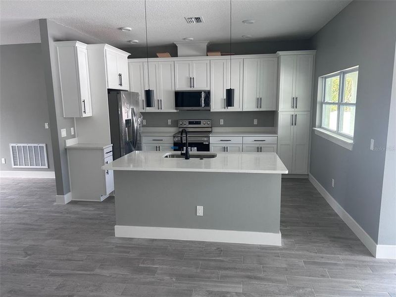 Furnished interior view inside a new home in , New Smyrna Beach (Image 5).