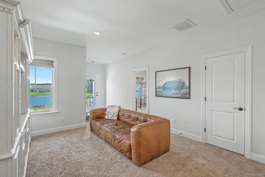 Furnished interior view inside a new home in Tidewater at Lakes of Cane Bay, Summerville (Image 33). Furnished interior view inside a new home in Tidewater at Lakes of Cane Bay, Summerville (Image 33).