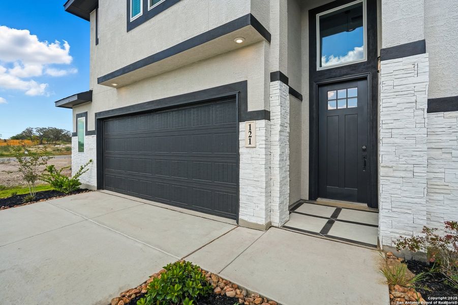 Exterior details and patio area of a home in Alsatian Oaks, Castroville (Image 28).