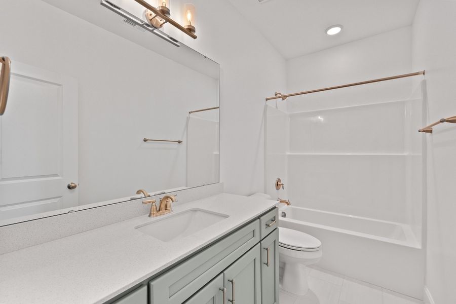 Representative furnished interior of a home built from the The Juniper by RobuckHomes in Kennebec Crossing, Angier (Image 14).