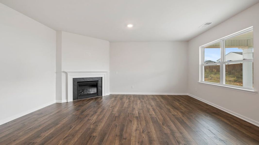 Spacious, unfurnished interior of a new home in Durbin Meadows Traditions, Fountain Inn (Image 23).