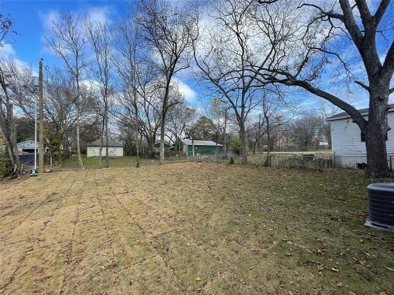 View of yard featuring central AC unit