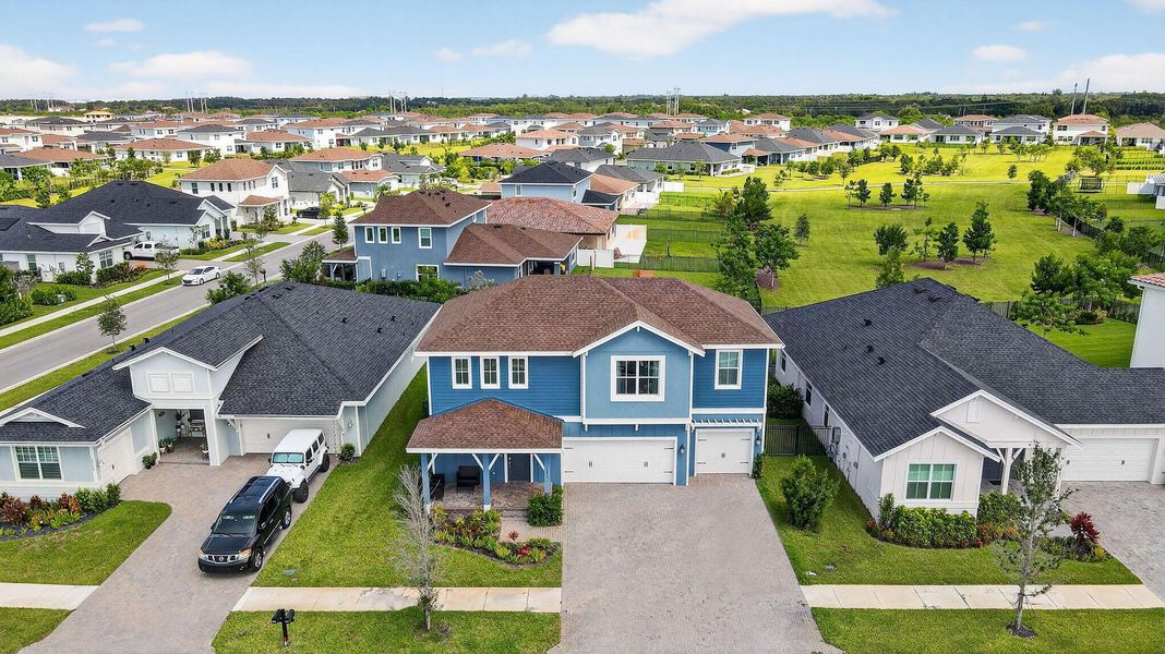 Front exterior of a new home in , Loxahatchee, FL, highlighting curb appeal (Image 29).