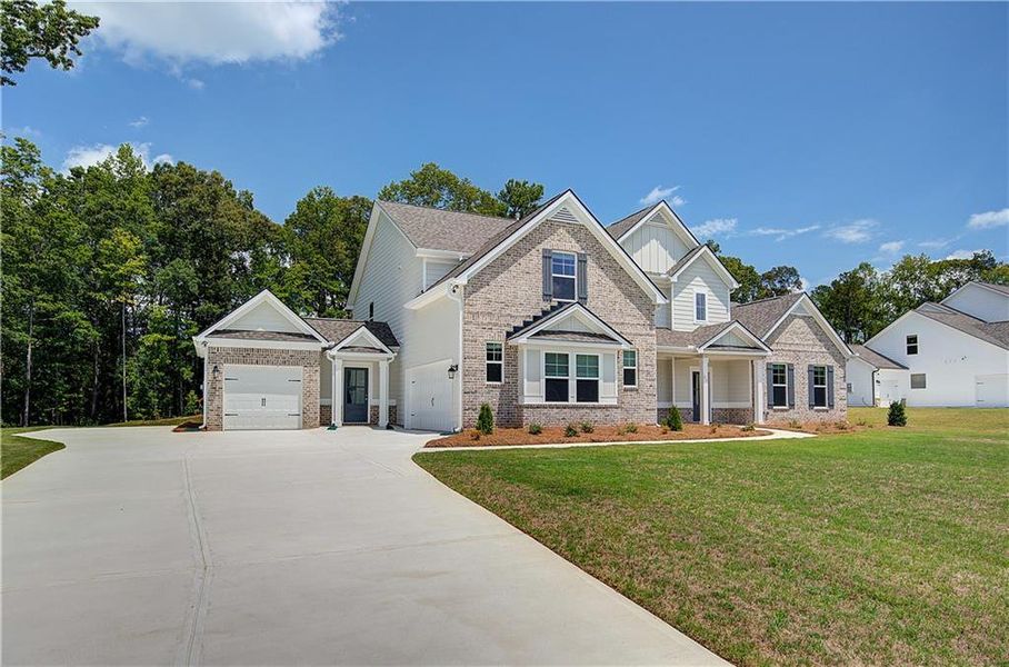 Front exterior of a new home in , Senoia, GA, highlighting curb appeal (Image 20).