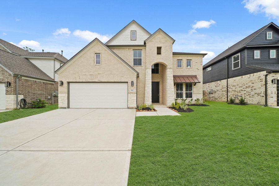 Front exterior of a new home in Barton Creek Ranch, Conroe, TX, highlighting curb appeal (Image 1). Front exterior of a new home in Barton Creek Ranch, Conroe, TX, highlighting curb appeal (Image 1).