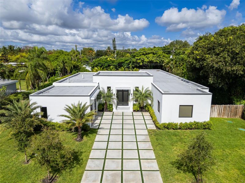 Front exterior of a new home in , Miami, FL, highlighting curb appeal (Image 19).