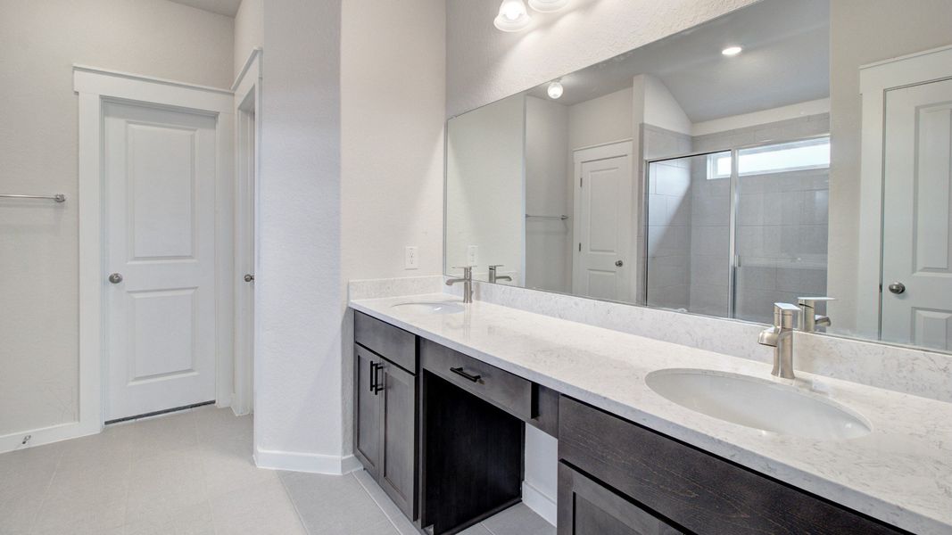 Representative furnished interior of a home built from the Majestic by Brightland Homes in Sunterra, Katy (Image 10).